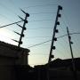 8 strand electric security fence around a house