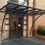 Entrance door roof construction