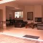 The living area at HRL opens onto a patio