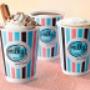 Cup of Affogato with Milky Lane ice cream and wafer, Espresso and Cappuccino on a pink surface and a peach background.