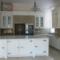 classical english kitchen with large centre island unit.