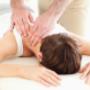 Chiropractor treating patient