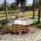 Landscape at Midrand Cemetry (includes water feature, paving and planting of shrubs and palm trees)