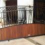 Wrought iron gate with wood infill