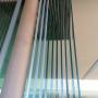 Frameless glass foldback