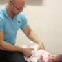 Dr Allison with a paediatric patient