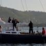 Packing away sails to dock