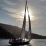 Returning at sunset through Knysna Heads