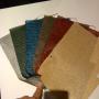 a variety of window cover colours and styles .