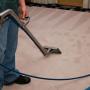Carpet cleaning in progress