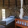 Rustic zulu rondavel - stone cottage.