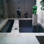 Formal Koi pond with stepping stones
