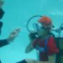 Instructor with bubble maker student