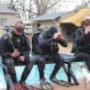 Instructors & Dive Master demonstrating boat entry
