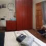 The nautical room with microwave and fridge