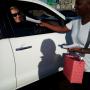 Promoters working an intersection