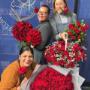 Florist team have a good laugh with red roses