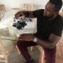Our Microscope being tested by our Angolan Client
