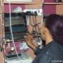 Worker testing printer cartridges