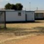 The Church of Jesus Christ, located in Orange Farm, on the Orange Farm Primary School grounds.  This is beyond the primary school gate.