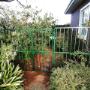 Security Gates with Baracuda Spikes in Heritage Green