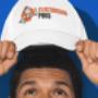 mockup-of-a-man-with-a-crewneck-sweatshirt-holding-a-dad-hat-over-his-head-27054-2.png