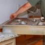 plumber putting in sink Plumbers Network.jpg