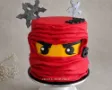 Red Ninjago birthday themed cake.  Frost