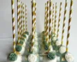 Beautiful Green and gold cake pops.  Frost